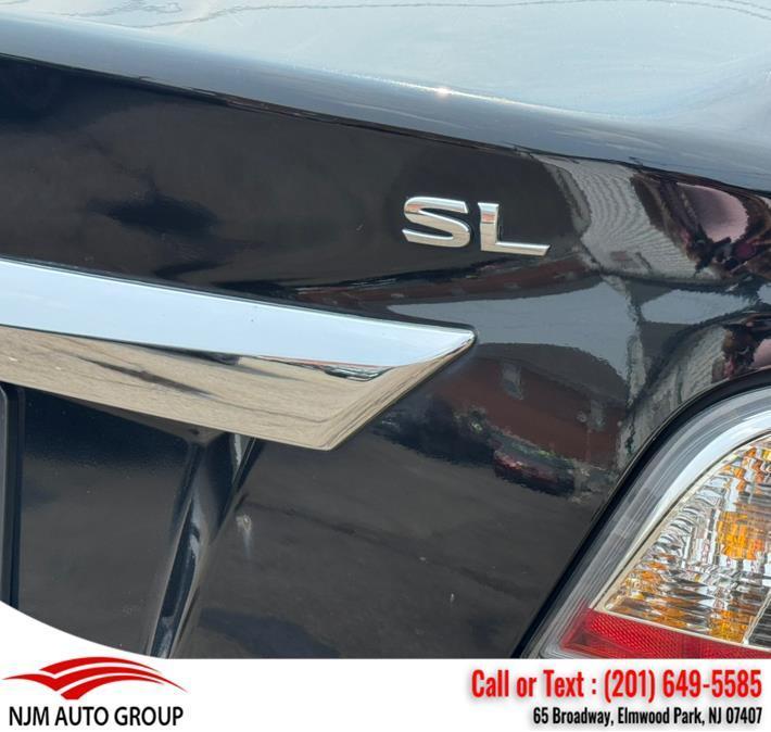 used 2015 Nissan Altima car, priced at $6,850