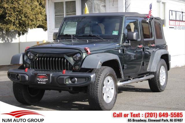 used 2011 Jeep Wrangler Unlimited car, priced at $14,995