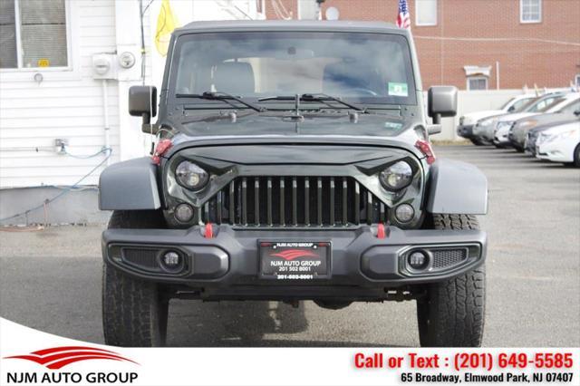used 2011 Jeep Wrangler Unlimited car, priced at $14,995