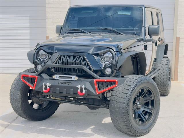 used 2016 Jeep Wrangler Unlimited car, priced at $22,995