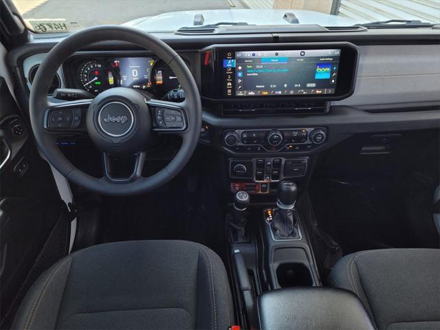 used 2024 Jeep Wrangler 4xe car, priced at $35,595