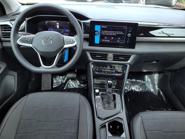 new 2025 Volkswagen Taos car, priced at $30,596