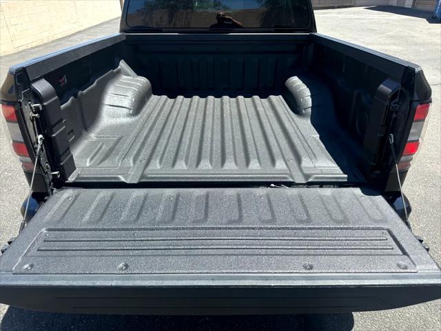 used 2024 Nissan Frontier car, priced at $30,999