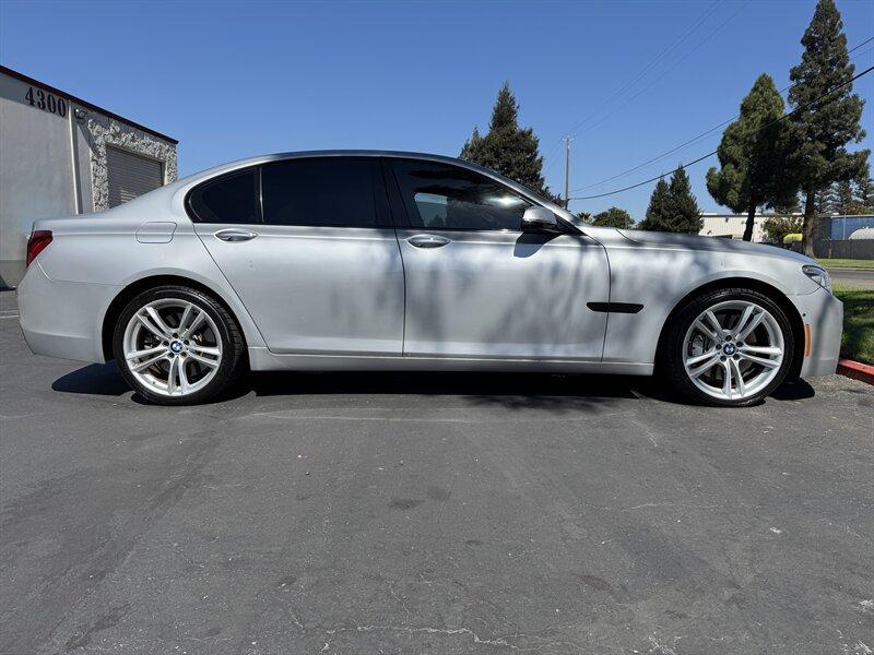used 2015 BMW 750 car, priced at $12,999