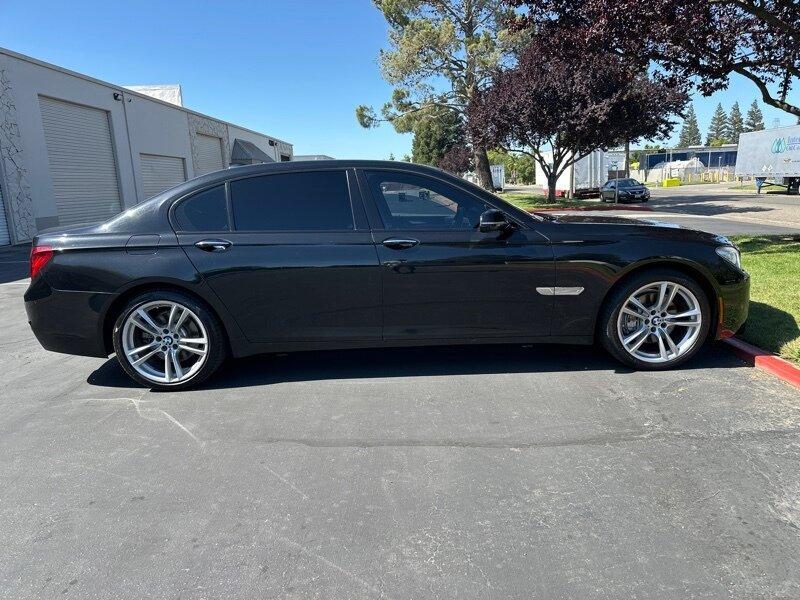 used 2014 BMW 740 car, priced at $11,999