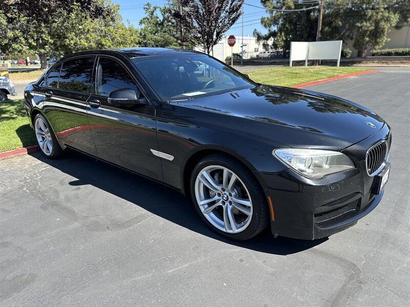 used 2014 BMW 740 car, priced at $11,999