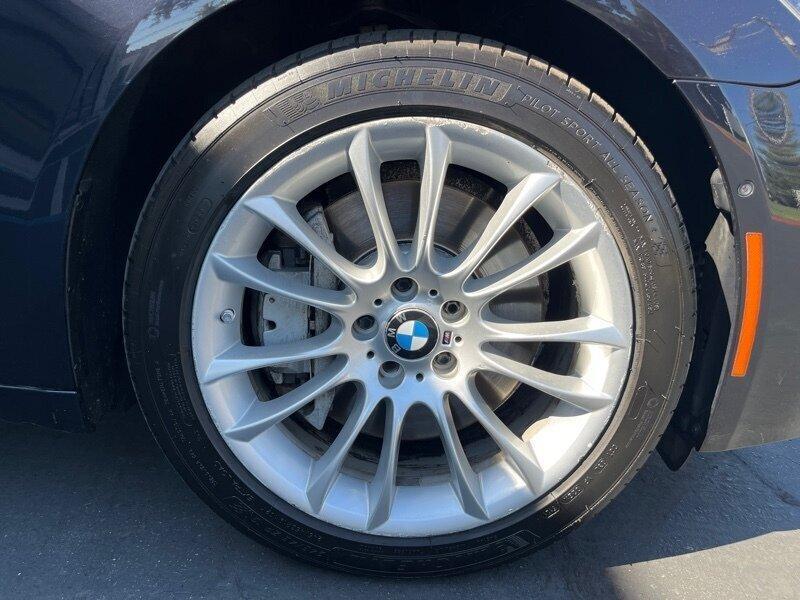 used 2014 BMW 750 car, priced at $11,999