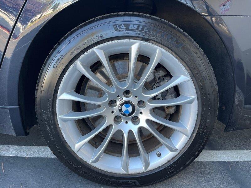 used 2014 BMW 750 car, priced at $11,999