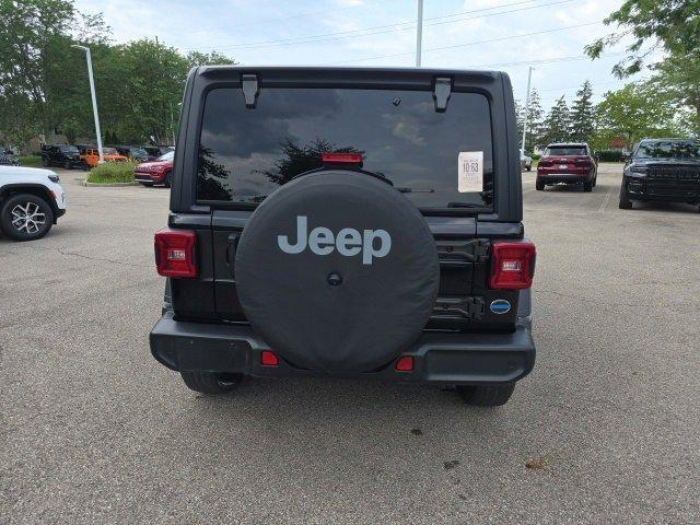 used 2021 Jeep Wrangler Unlimited car, priced at $27,253