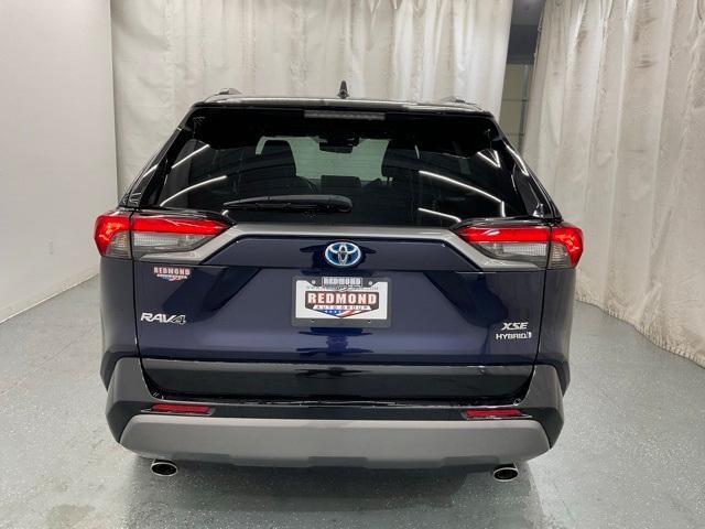 used 2021 Toyota RAV4 Hybrid car, priced at $31,500