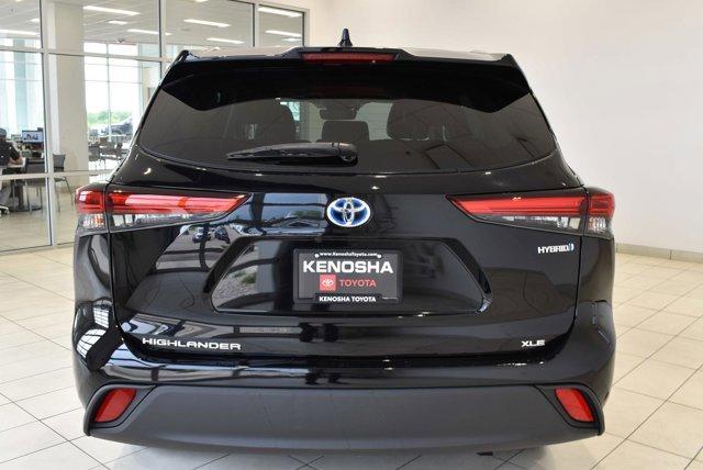 used 2021 Toyota Highlander Hybrid car, priced at $34,890