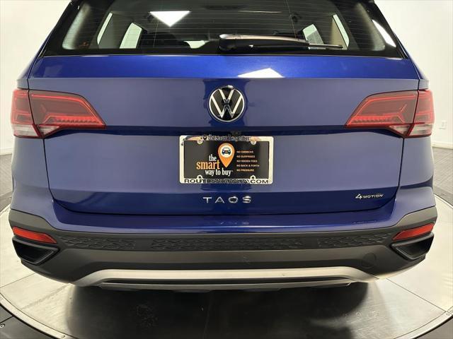 used 2024 Volkswagen Taos car, priced at $23,500