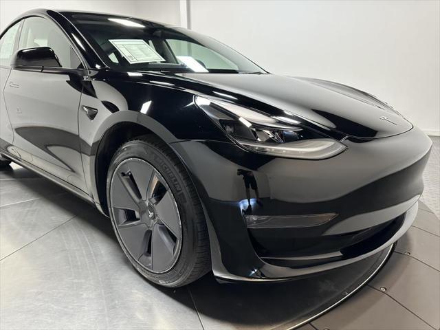 used 2023 Tesla Model 3 car, priced at $30,000