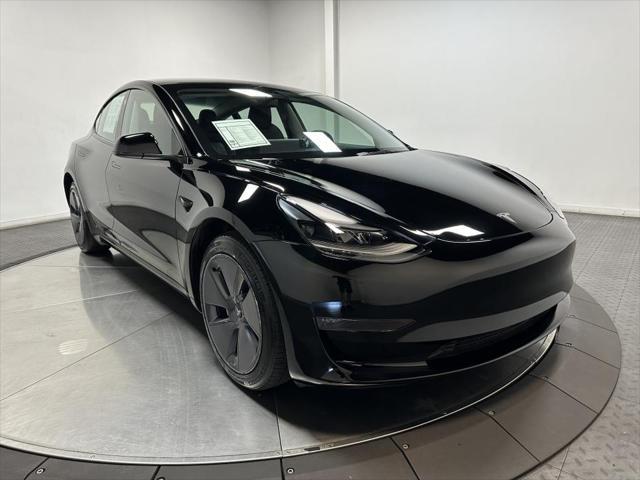 used 2023 Tesla Model 3 car, priced at $30,000