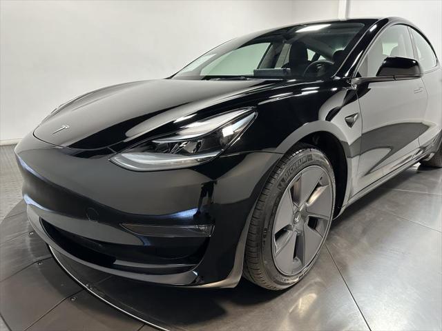 used 2023 Tesla Model 3 car, priced at $30,000