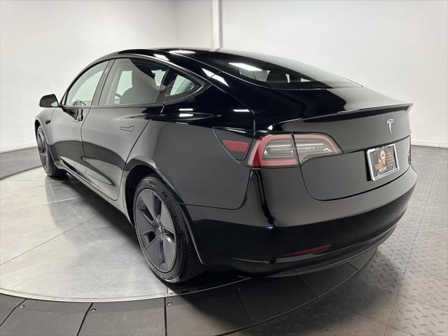 used 2023 Tesla Model 3 car, priced at $30,000