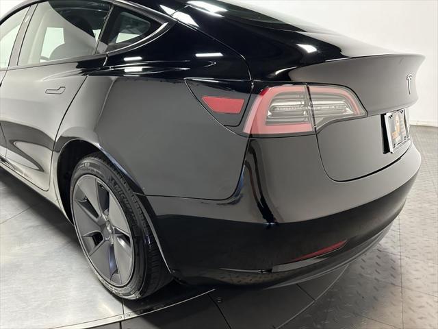 used 2023 Tesla Model 3 car, priced at $30,000