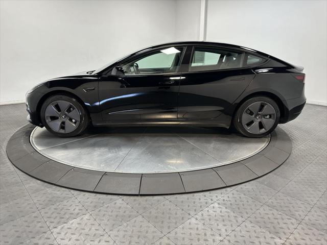 used 2023 Tesla Model 3 car, priced at $30,000