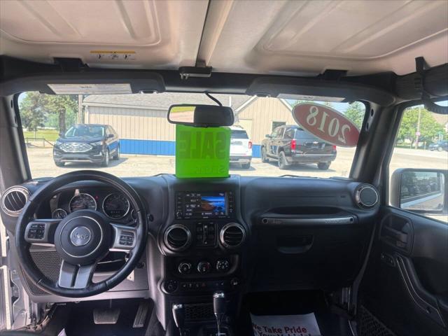 used 2018 Jeep Wrangler JK Unlimited car, priced at $19,995