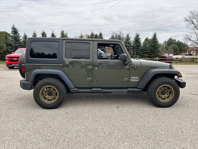 used 2015 Jeep Wrangler Unlimited car, priced at $18,995