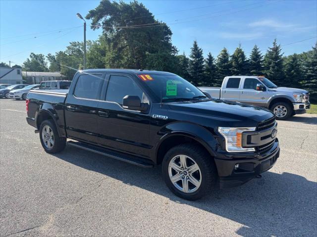 used 2018 Ford F-150 car, priced at $26,495