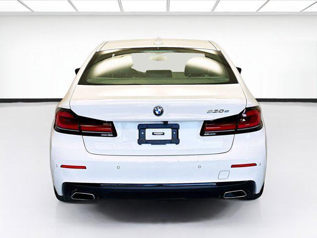 used 2023 BMW 530e car, priced at $33,323