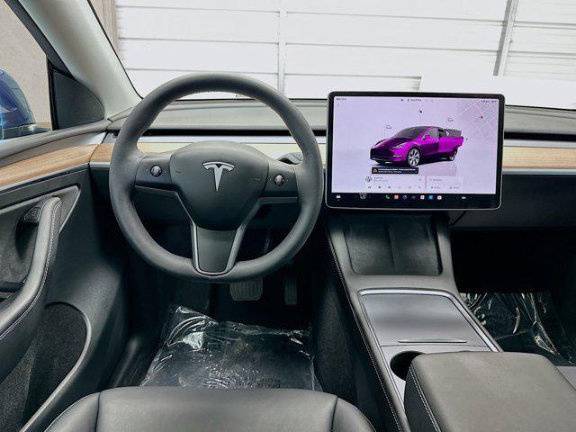 used 2023 Tesla Model Y car, priced at $34,434