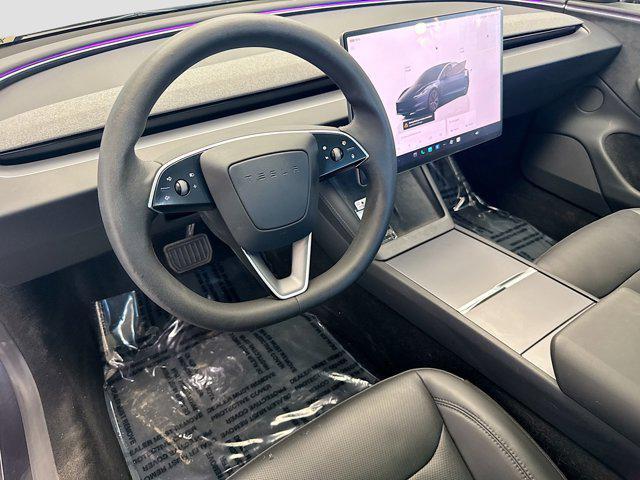 used 2024 Tesla Model 3 car, priced at $34,298