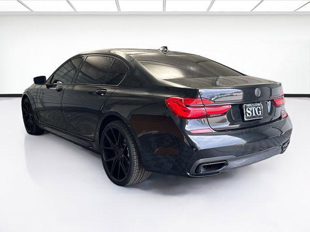 used 2016 BMW 740 car, priced at $18,267