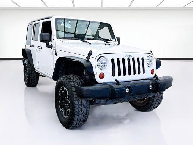 used 2013 Jeep Wrangler Unlimited car, priced at $14,850