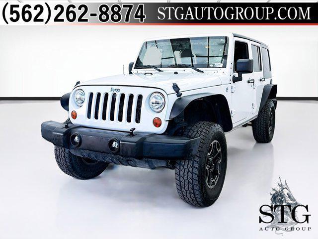 used 2013 Jeep Wrangler Unlimited car, priced at $14,850