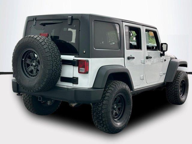 used 2016 Jeep Wrangler Unlimited car, priced at $29,200