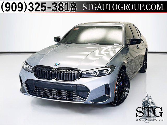 used 2023 BMW 330e car, priced at $40,540