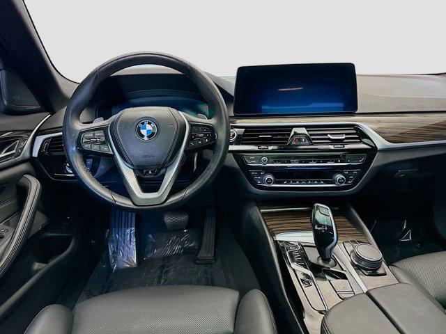 used 2023 BMW 530e car, priced at $33,927