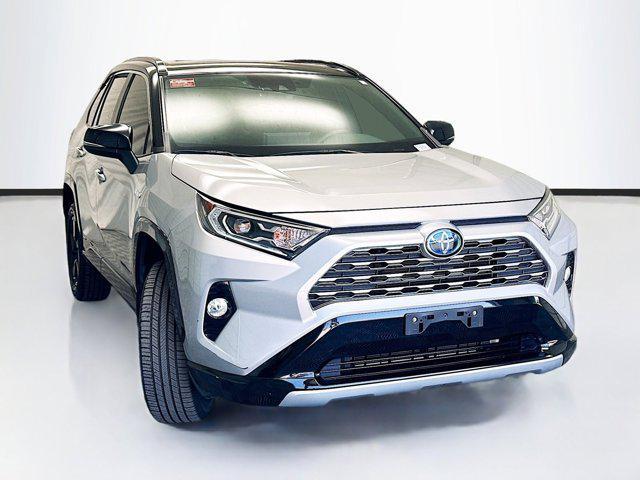 used 2019 Toyota RAV4 Hybrid car, priced at $31,388