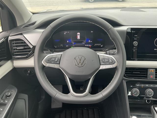 new 2025 Volkswagen Taos car, priced at $28,500