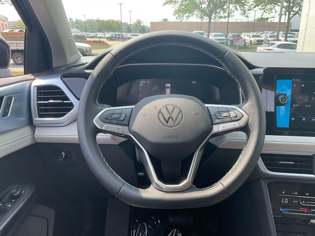 new 2025 Volkswagen Taos car, priced at $30,999