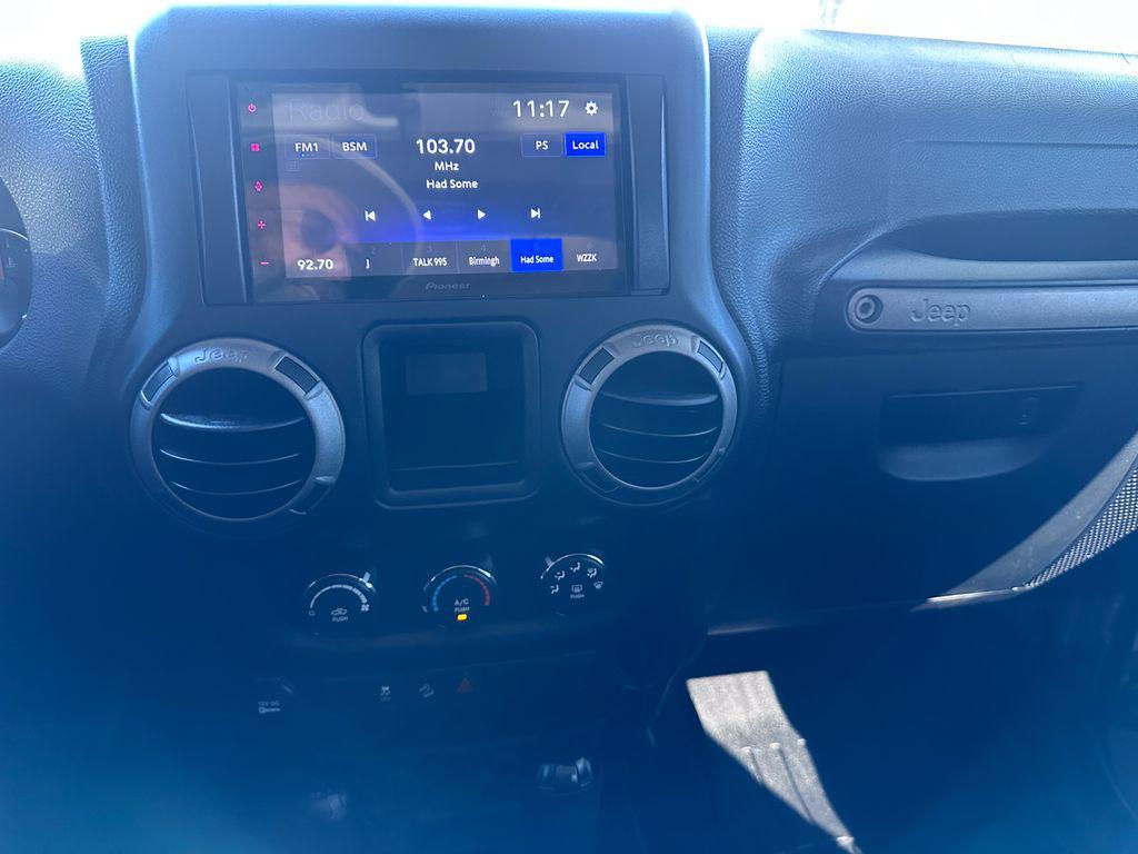 used 2016 Jeep Wrangler Unlimited car, priced at $18,425