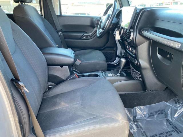 used 2016 Jeep Wrangler Unlimited car, priced at $14,999