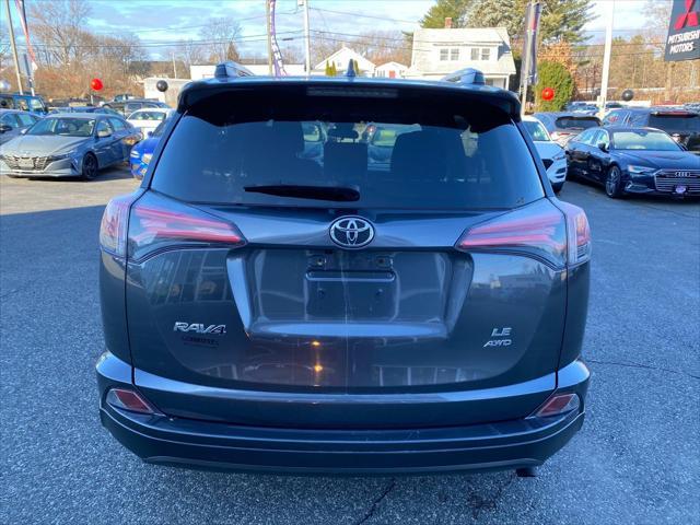 used 2018 Toyota RAV4 car, priced at $16,599