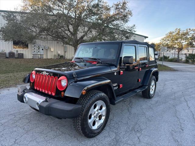 used 2013 Jeep Wrangler Unlimited car, priced at $16,695