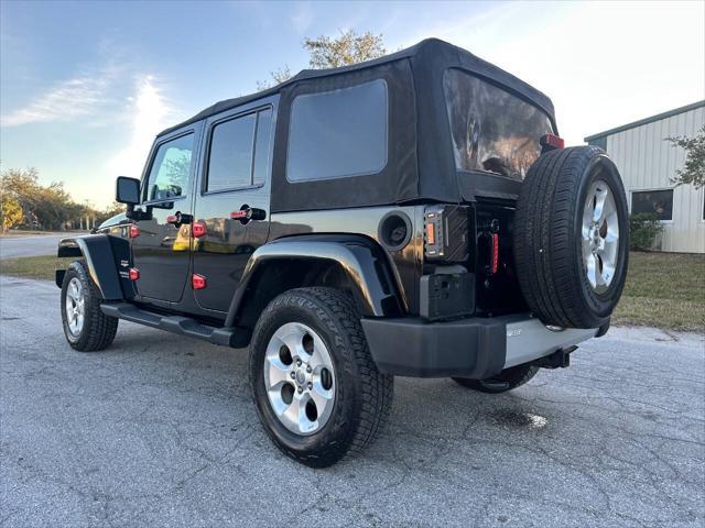 used 2013 Jeep Wrangler Unlimited car, priced at $16,695