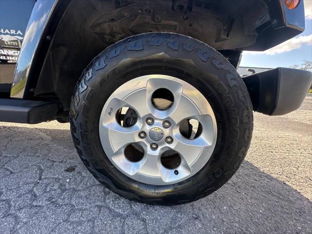 used 2013 Jeep Wrangler Unlimited car, priced at $16,695