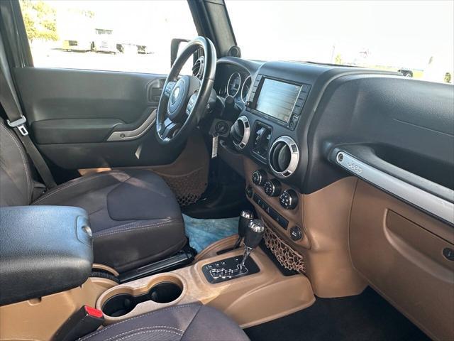 used 2013 Jeep Wrangler Unlimited car, priced at $16,695