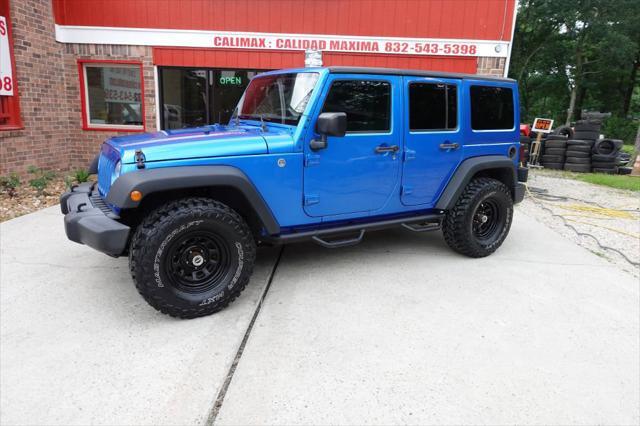 used 2016 Jeep Wrangler Unlimited car, priced at $23,977