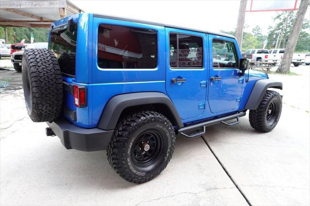 used 2016 Jeep Wrangler Unlimited car, priced at $23,977