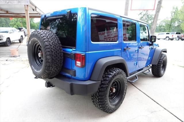 used 2016 Jeep Wrangler Unlimited car, priced at $23,977