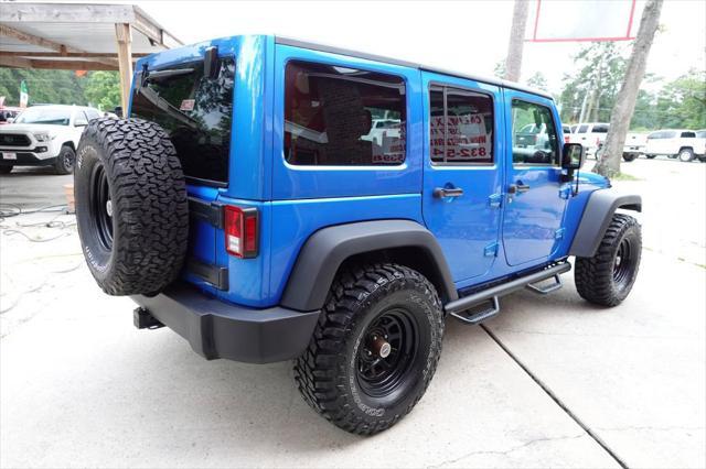 used 2016 Jeep Wrangler Unlimited car, priced at $23,977