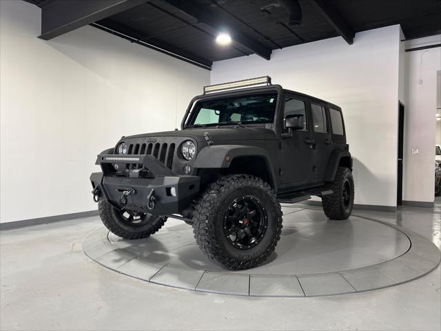 used 2016 Jeep Wrangler Unlimited car, priced at $23,990