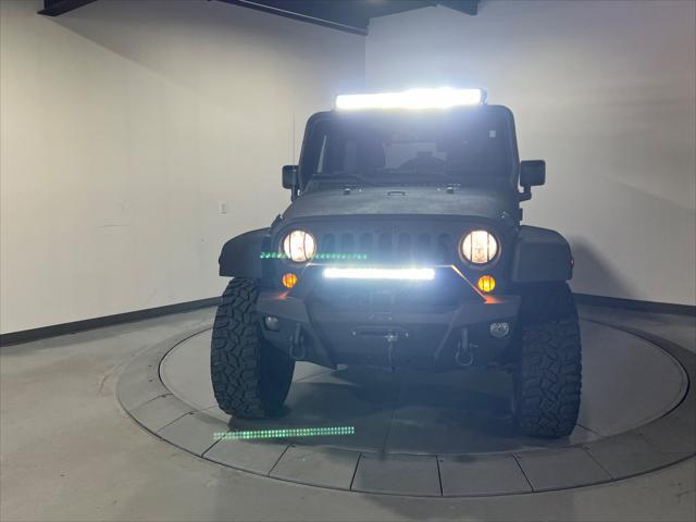 used 2016 Jeep Wrangler Unlimited car, priced at $23,990